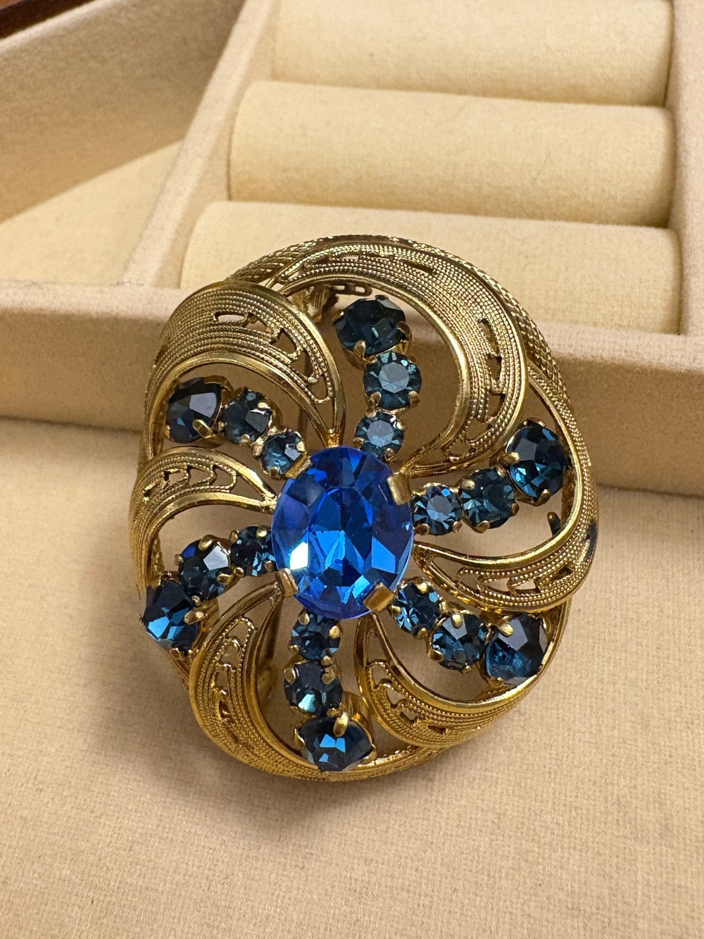 Gold Tone Brooch with Deep Blue Crystal Center AS IS